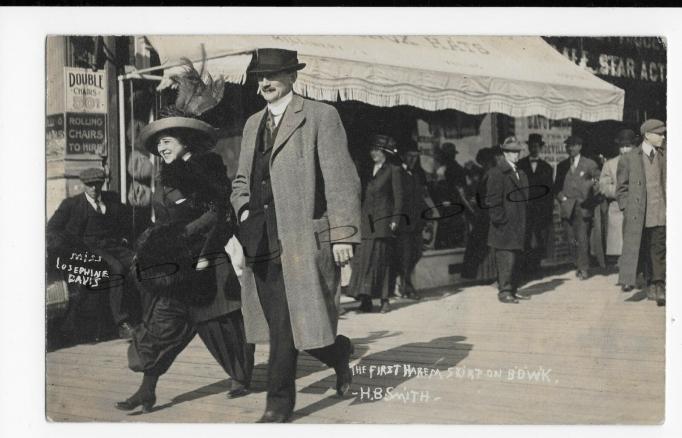 Atlantic City - Very up to date woman in bloomers and friend strolling on the boards - c 1911